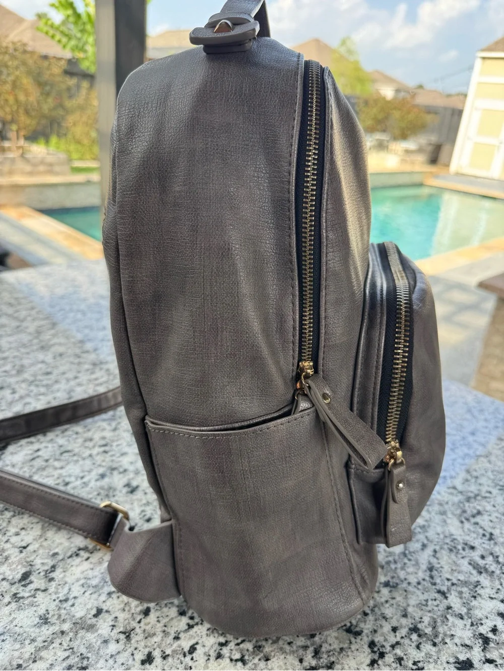 MMS Design Studio gray faux leather backpack